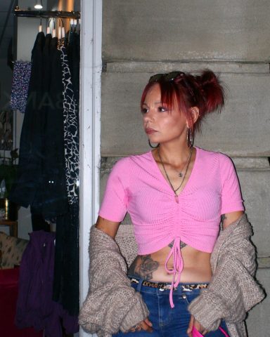 Y2K model Marie posing in retro fashion during a night photography shoot