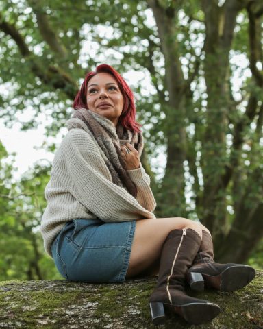 atumn photoshoot forest of dean Autumn fashion model sitting on a fallen tree in the Forest of Dean, Gloucestershire